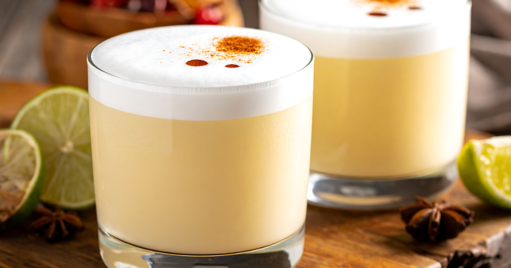 Two glasses of pisco sour from a popular bar in Cusco