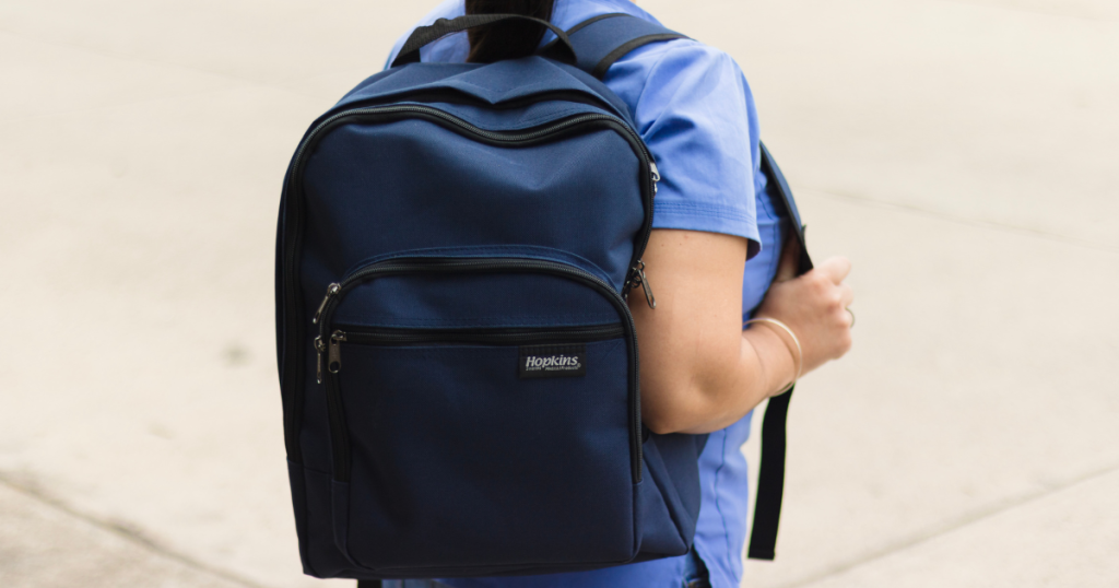 Volunteer in Cusco carries a backpack