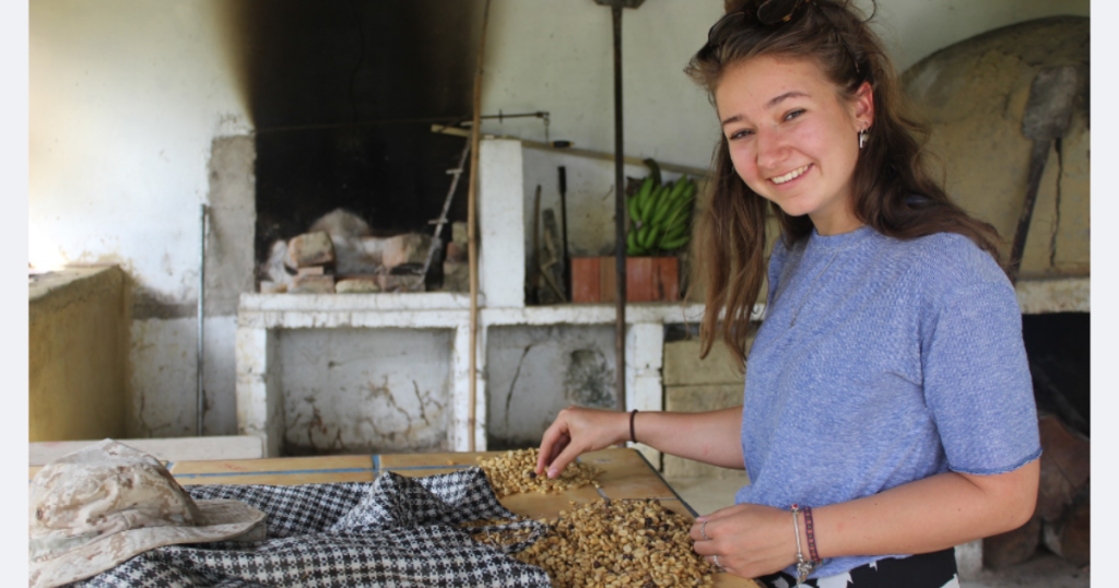 Volunteer in the Sacred Valley in Peru sorts seeds